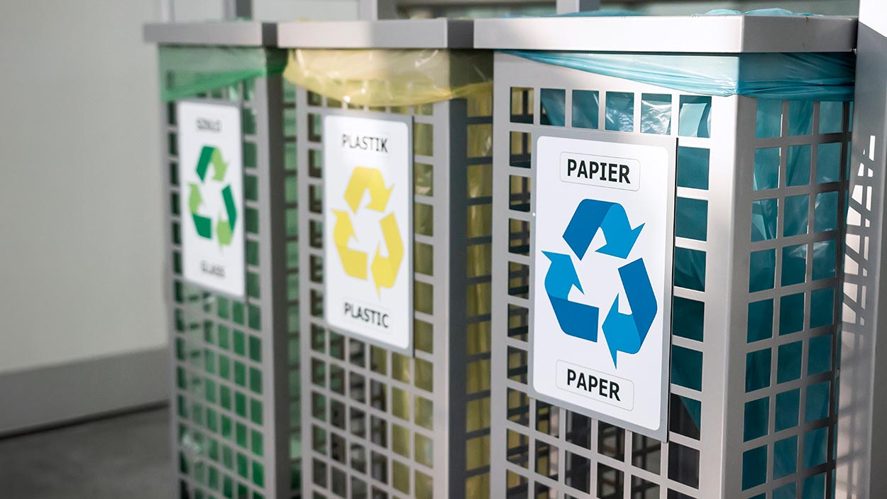 Organized recycling station with bins for plastic, paper, and more.